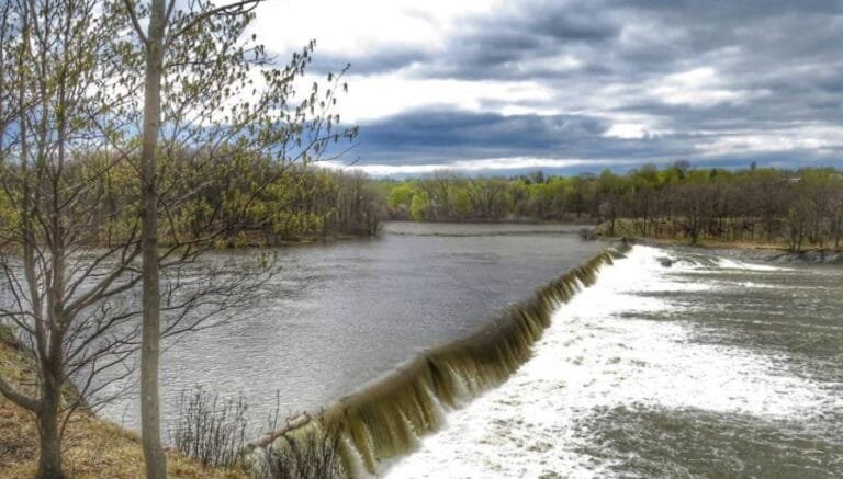 What Should You Do When Approaching A Low-Head Dam In A Canoe Or Kayak?