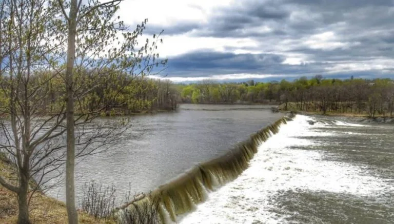 What Should You Do When Approaching A Low-Head Dam In A Canoe Or Kayak?